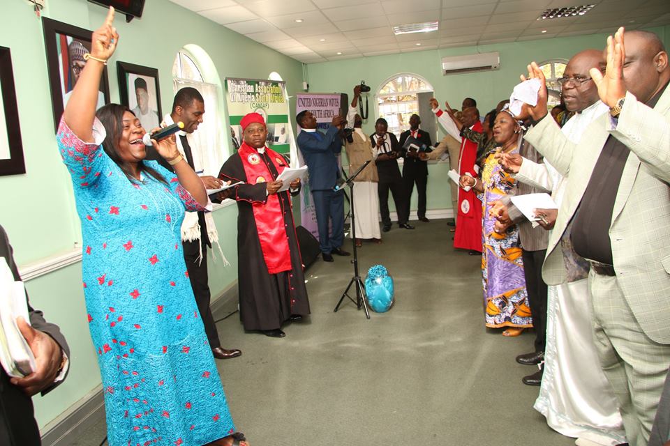 Mrs Abimbola Adeolu leading the praise