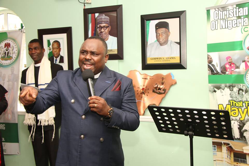 Rev Dr. Soji Soogun Leading a prayer session